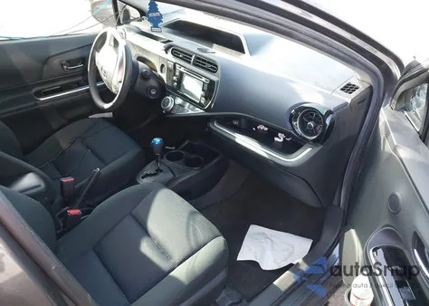 2015 Toyota Prius C from USA, damaged, VIN JTDKDTB33F1583432